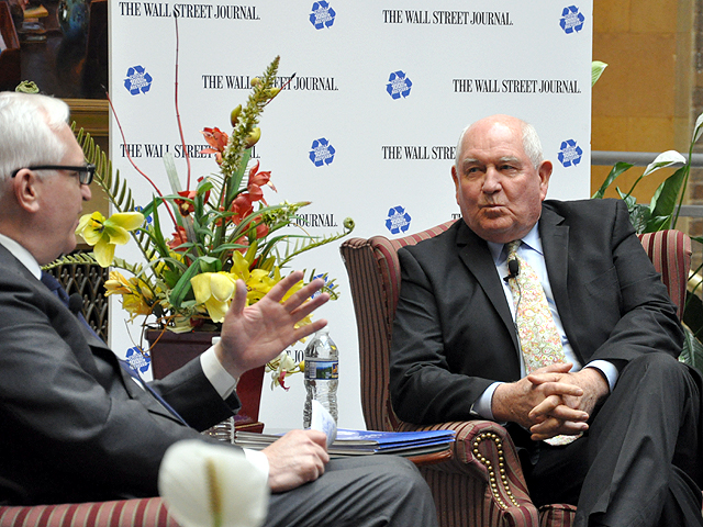 Agriculture Secretary Sonny Perdue, right, spoke in a question-and-answer forum Wednesday at the USDA headquarters at an event sponsored by the Wall Street Journal. Paul Gigot, editorial page editor for the WSJ, questioned Perdue on trade and regulatory issues. (DTN photo by Chris Clayton)